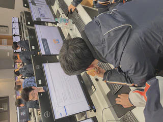 Club president at the whiteboard